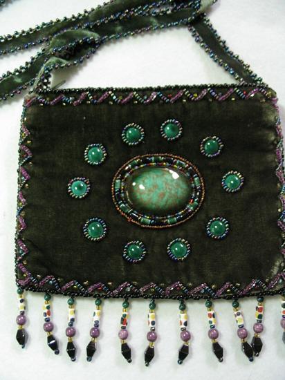 Olive green small purse w/ 10 pts. around center